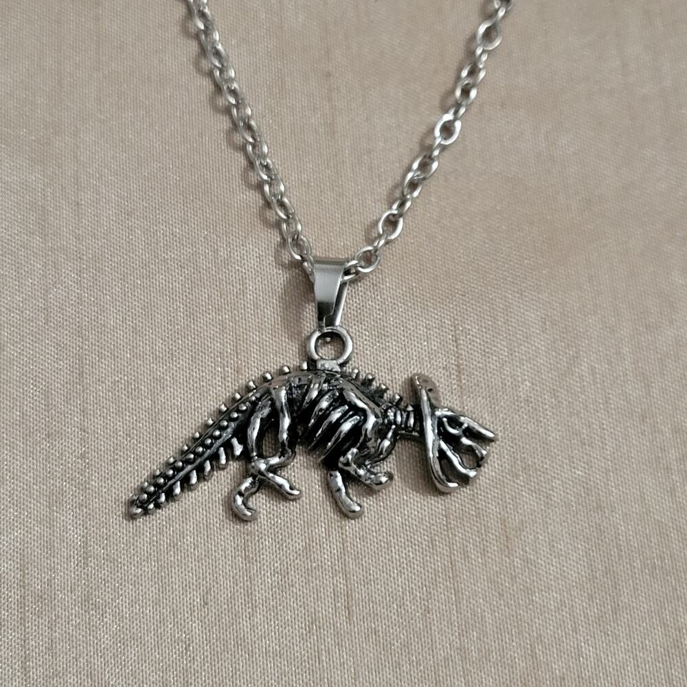 Triceratops dinosaur fossil skeleton necklace